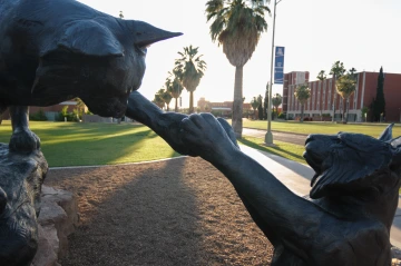 Statue of two wildcats.